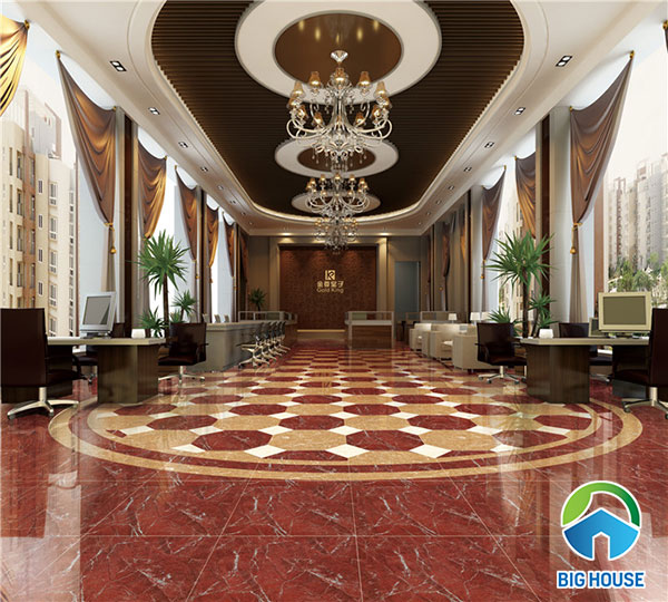 Gạch đỏ giả đá kết hợp với thảm gạch ấn tượng nhiều mầu làm nổi bật không gian phòng khách