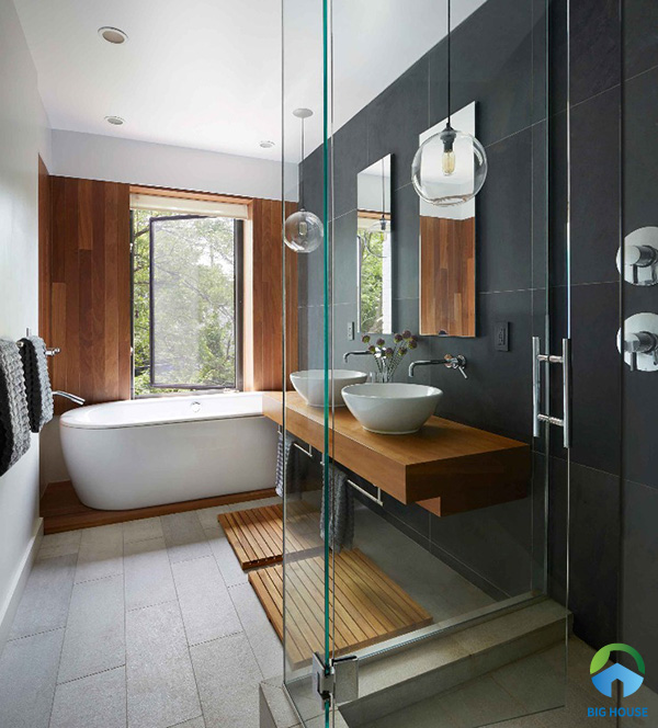 Trang trí phòng tắm bằng gạch xám đậm kết hợp với gạch lát sàn tone nhạt hơn tạo sự hài hòa cho không gian